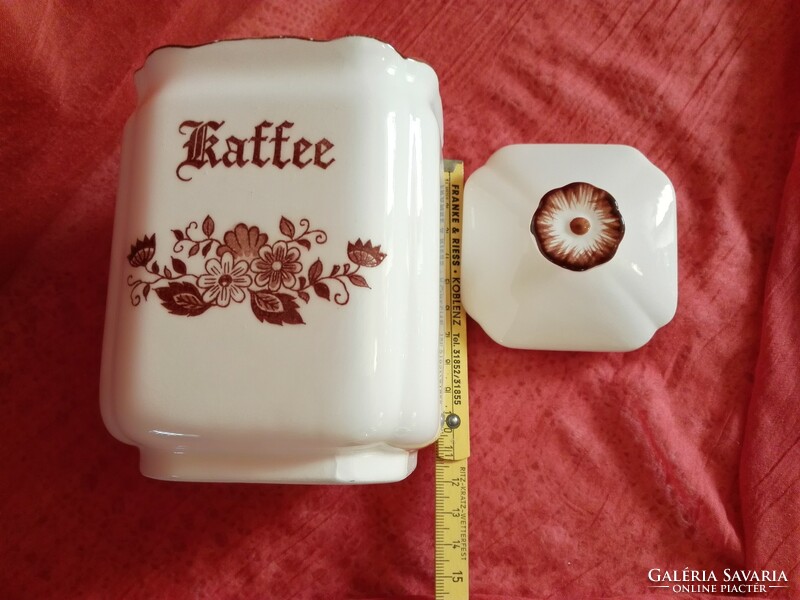 Porcelain coffee holder with lid.