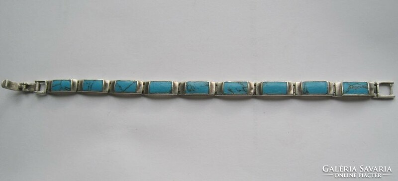 Silver bracelet with turquoise inserts