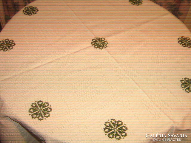 Beautiful elegant hand-embroidered woven tablecloth with lacy edges