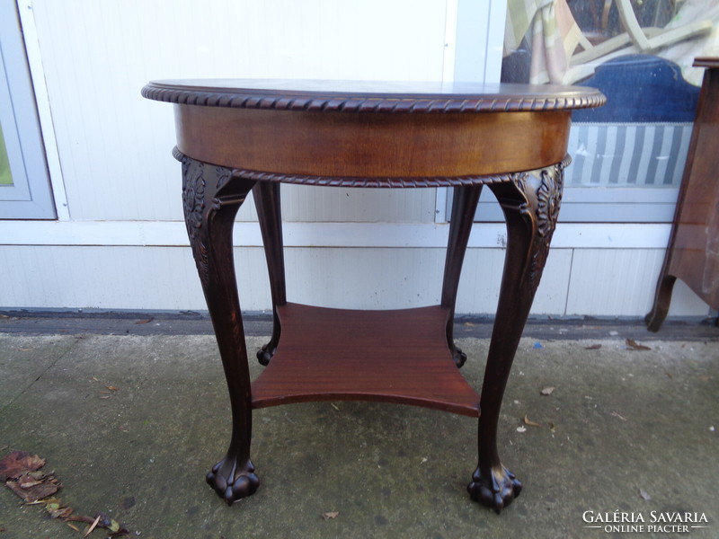 Table with clawed legs