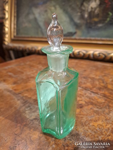 Apothecary glass colored in rare green material