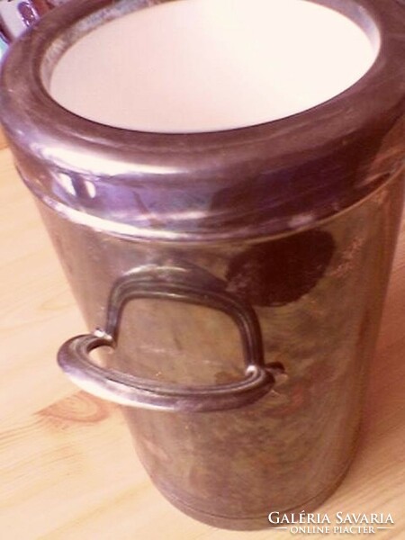 Retro party accessory, thermos with bottle of drink, pewter dish