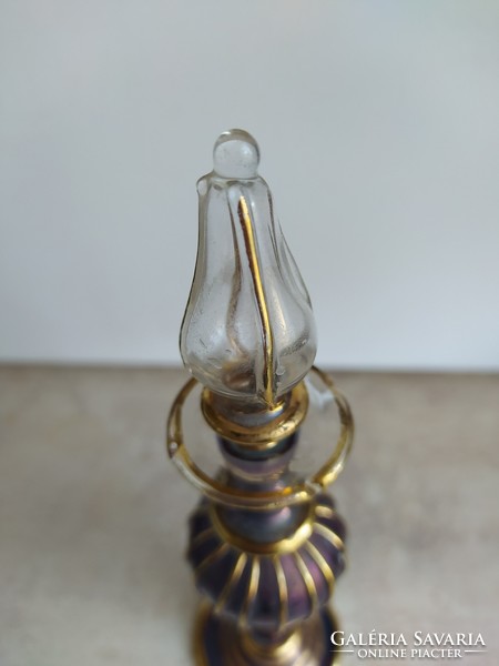Beautiful iridescent blown glass perfume gilded bottle