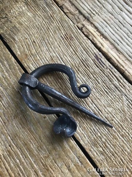 Old wrought iron fibula