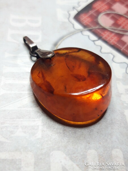 Old large amber silver pendant