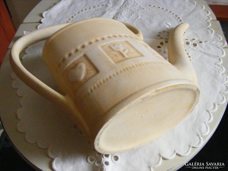 Ceramic watering can