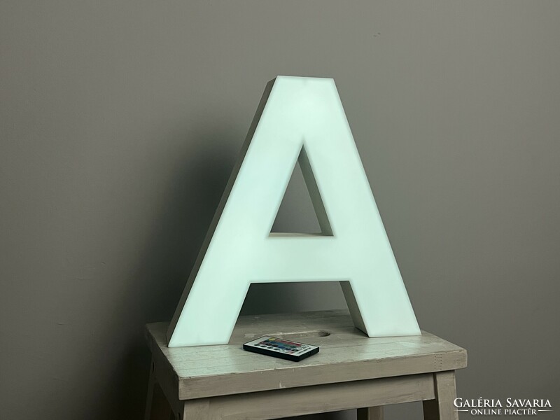 Color-changing monogrammed LED mood lamp for children's rooms