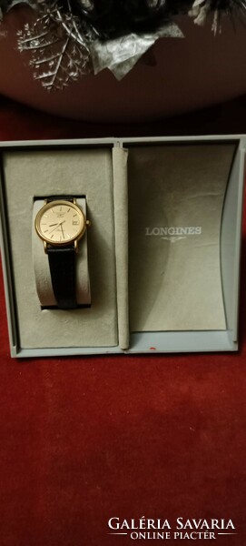 Longines women's quartz leather watch with serial number and original warranty card