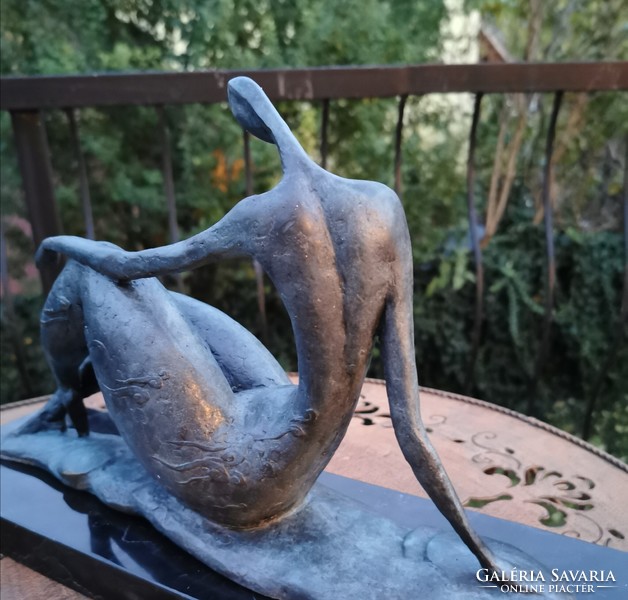 Resting female act - bronze sculpture