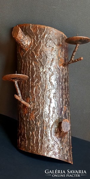 Wrought iron wall tree trunk candle holder is negotiable