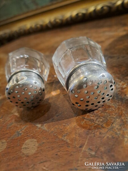 Cute silver Pest spice holder in a pair