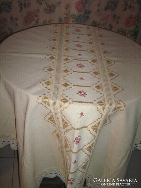 Elegant woven tablecloth with beautiful floral hand-embroidered azure crochet edge