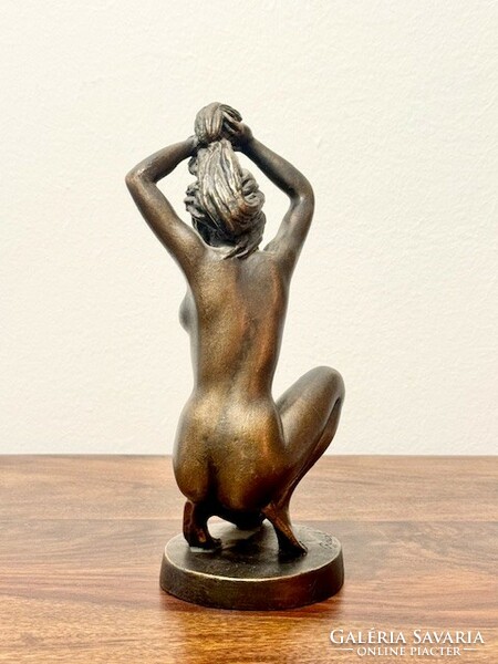 Rácz edit female nude sculpture combing her hair
