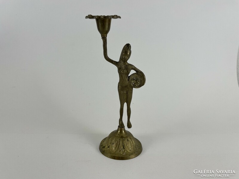 Copper candle holder in the shape of a female statue