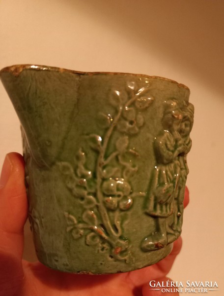 Very old ceramic spout