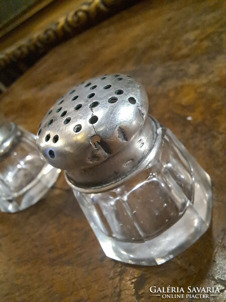 Cute silver Pest spice holder in a pair