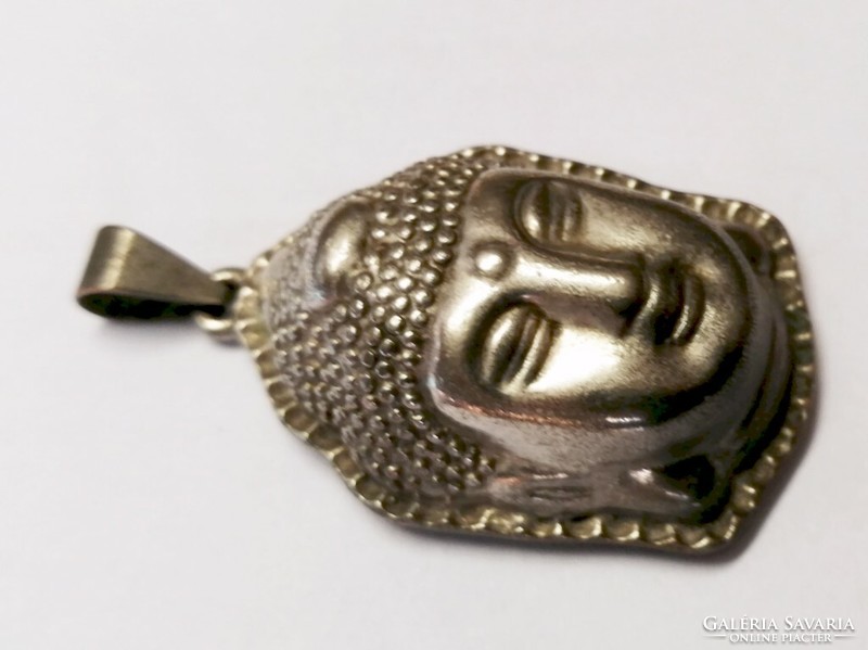 Antique Indian jewelry. Silver-plated buddha hollow pendant