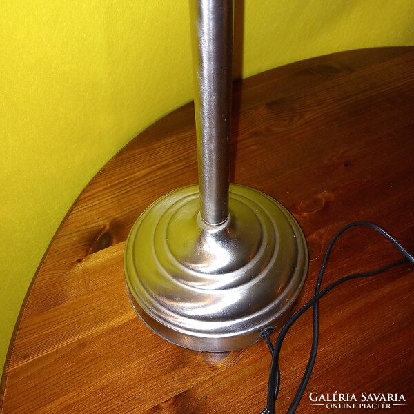 Chrome, tiltable, table or workshop lamp. It works.