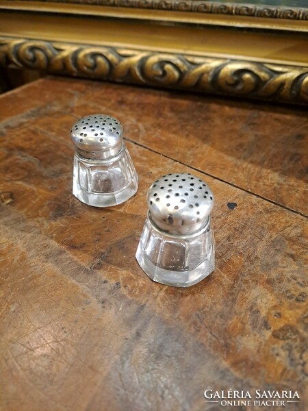 Cute silver Pest spice holder in a pair