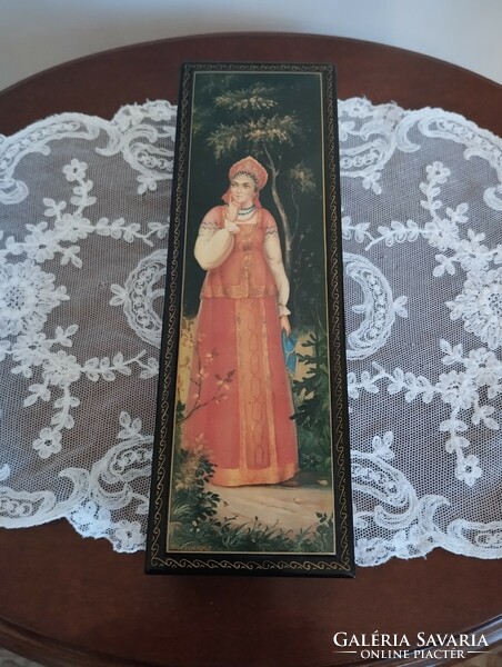 Beautiful Russian lacquer box with a beautiful female folk costume figure