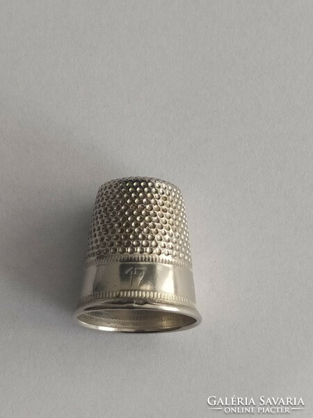 Silver colored thimble!
