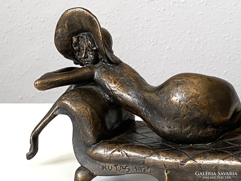 Sculptor László Kutas (1936-2023) retro resin statue of a female nude with a hat lying on a couch