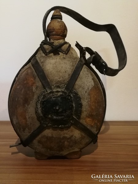 Antique horsehide water bottle.