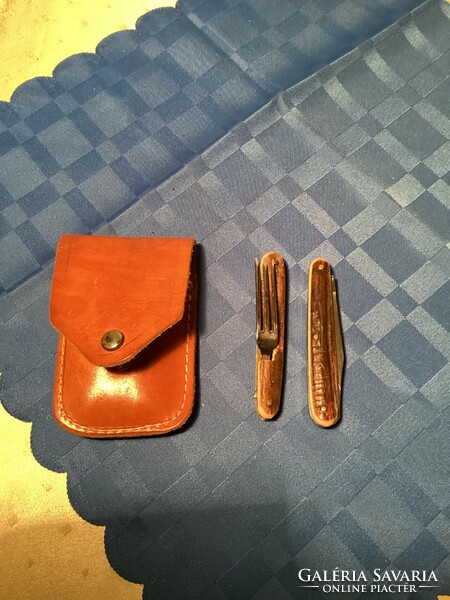 Pocket knife with antler handle and fork in leather case.