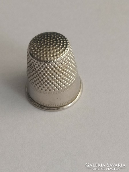 Silver colored thimble!