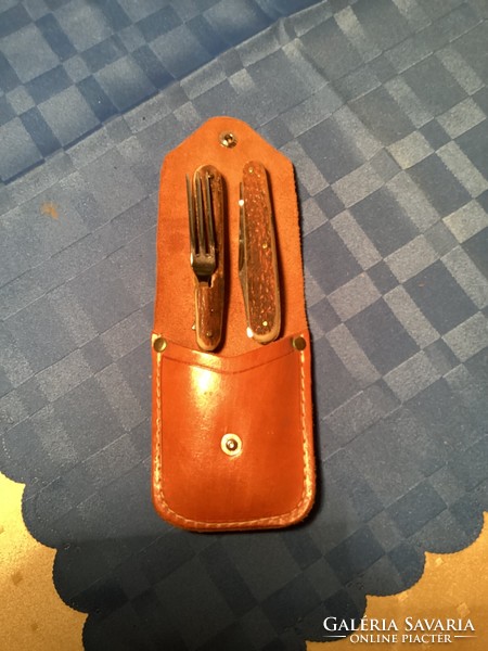 Pocket knife with antler handle and fork in leather case.