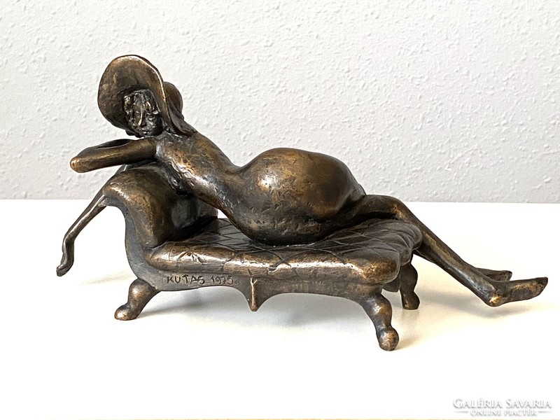 Sculptor László Kutas (1936-2023) retro resin statue of a female nude with a hat lying on a couch