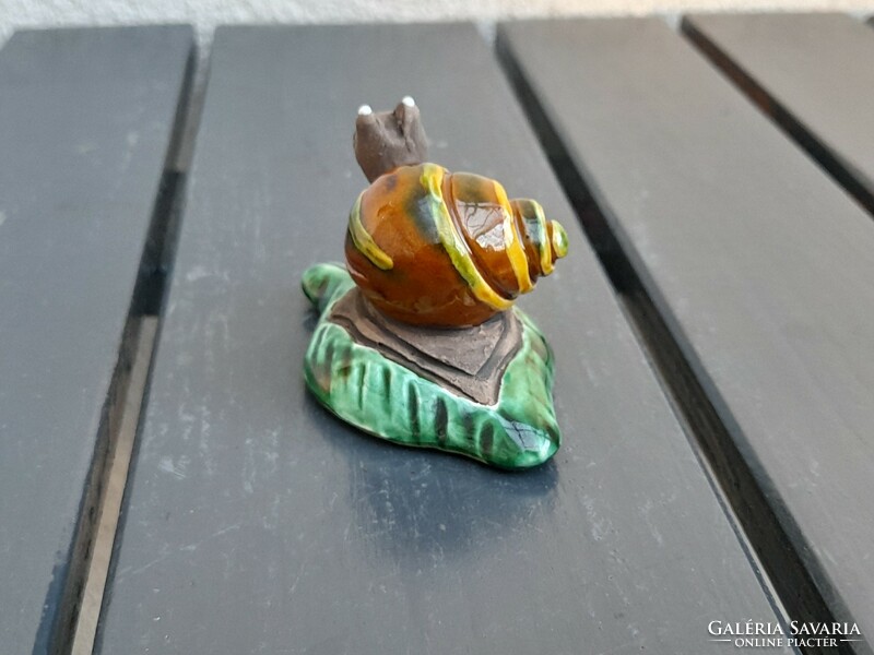 Fairy-marked ceramic snail