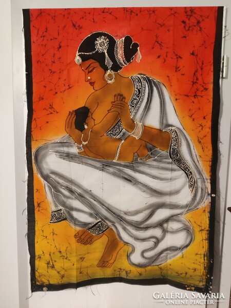 Hindu woman breastfeeding her child, batik mural painted on Indian canvas from India