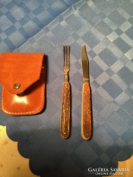 Pocket knife with antler handle and fork in leather case.