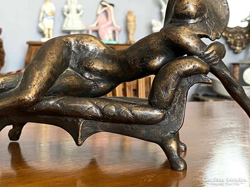 Sculptor László Kutas (1936-2023) retro resin statue of a female nude with a hat lying on a couch