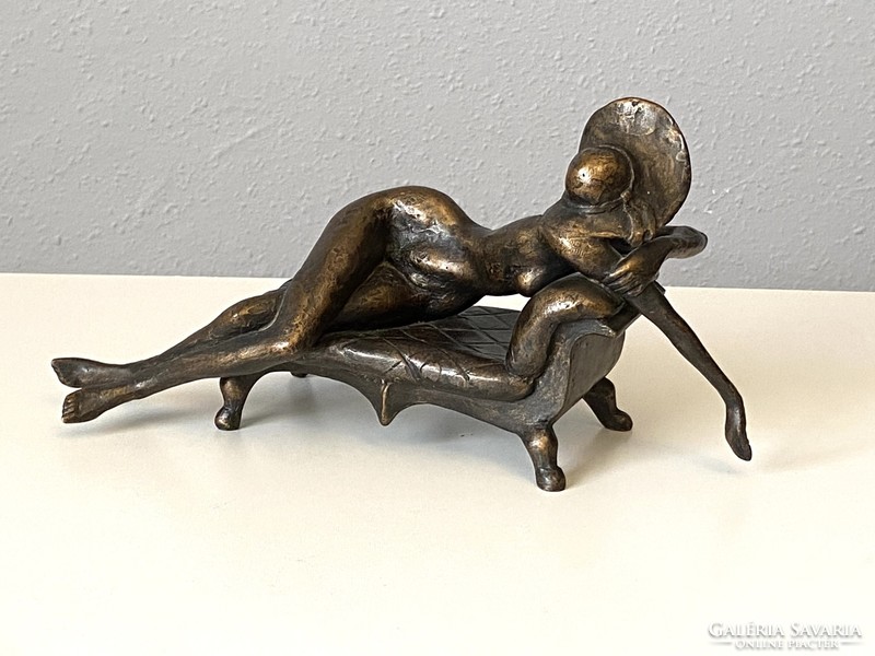 Sculptor László Kutas (1936-2023) retro resin statue of a female nude with a hat lying on a couch