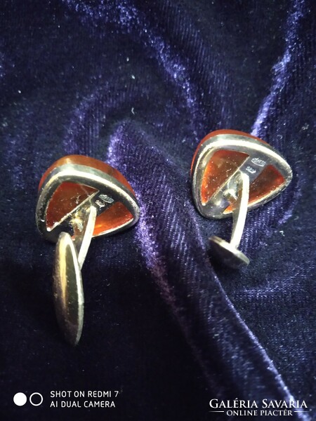 Pair of silver Russian (875) women's cufflinks with amber stones.