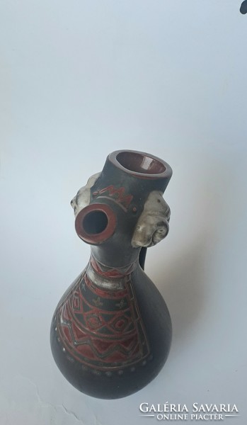 Ceramic jug with ram's head, spout