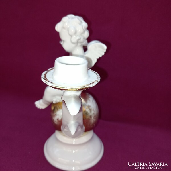 Old, winged putto, porcelain, table candle holder.