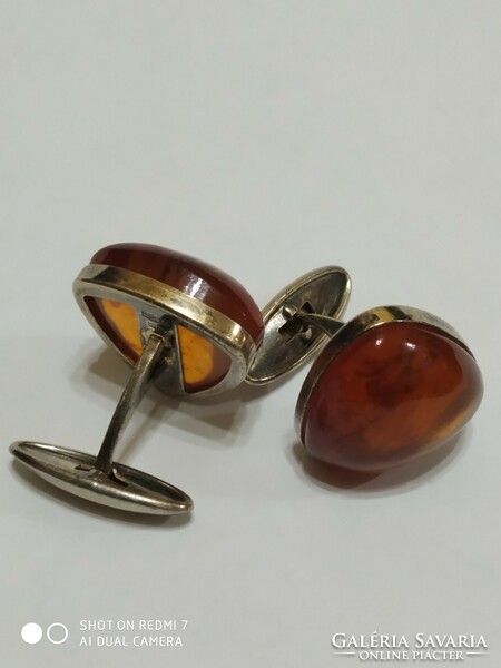 Pair of silver Russian (875) women's cufflinks with amber stones.