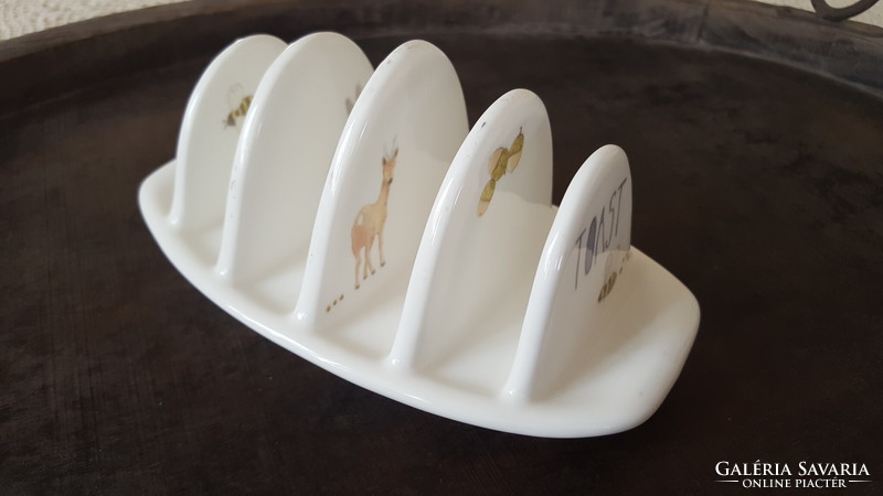 Porcelain toast holder with pictures of animal figures