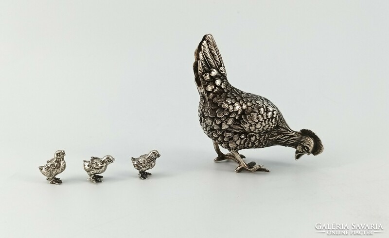 Silver chicks and the hen :)
