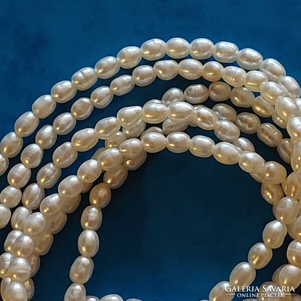 Beautiful two-row genuine cultured pearl necklace with gold-plated silver fittings