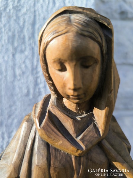 Beautiful carved statue mária àbràzolàs, madonna distorted antique statue