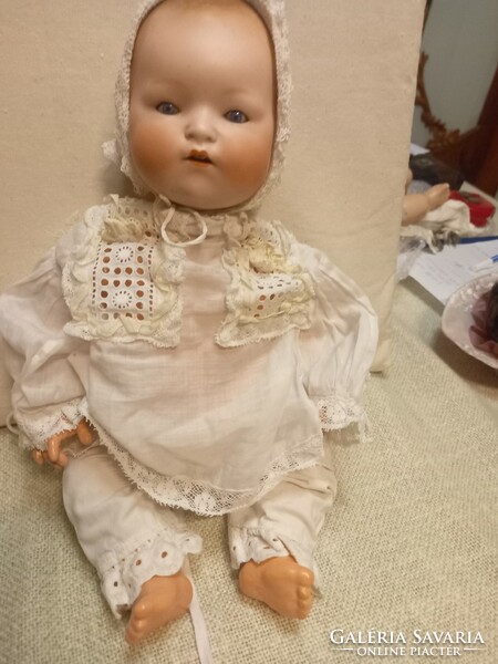 Antique doll with Heubach Köppelsdorf porcelain head