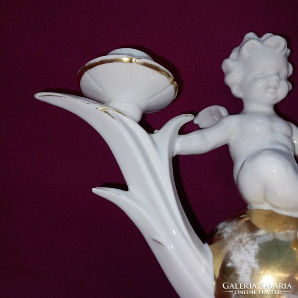 Old, winged putto, porcelain, table candle holder.