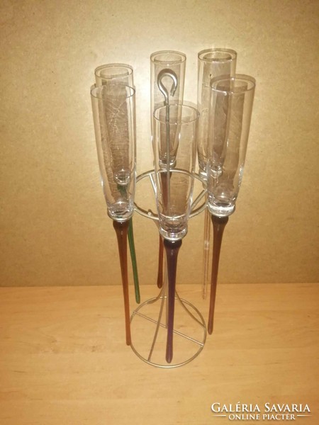 Stemless colored glass champagne glasses with metal holders