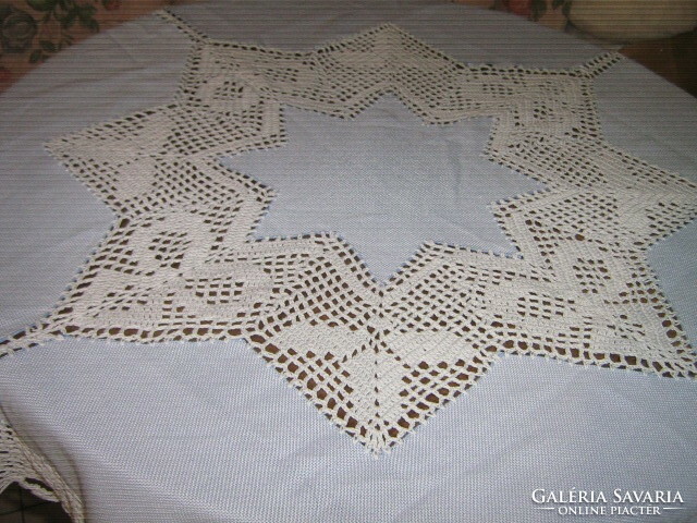Beautiful blue tablecloth with crocheted edges and inlays