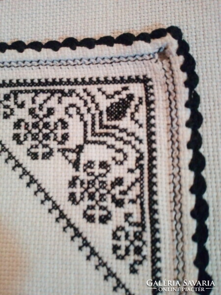 Antique cross stitch tablecloths.