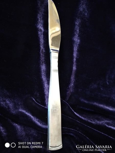 Knife with silver (Swedish 830) handle, stainless steel blade.